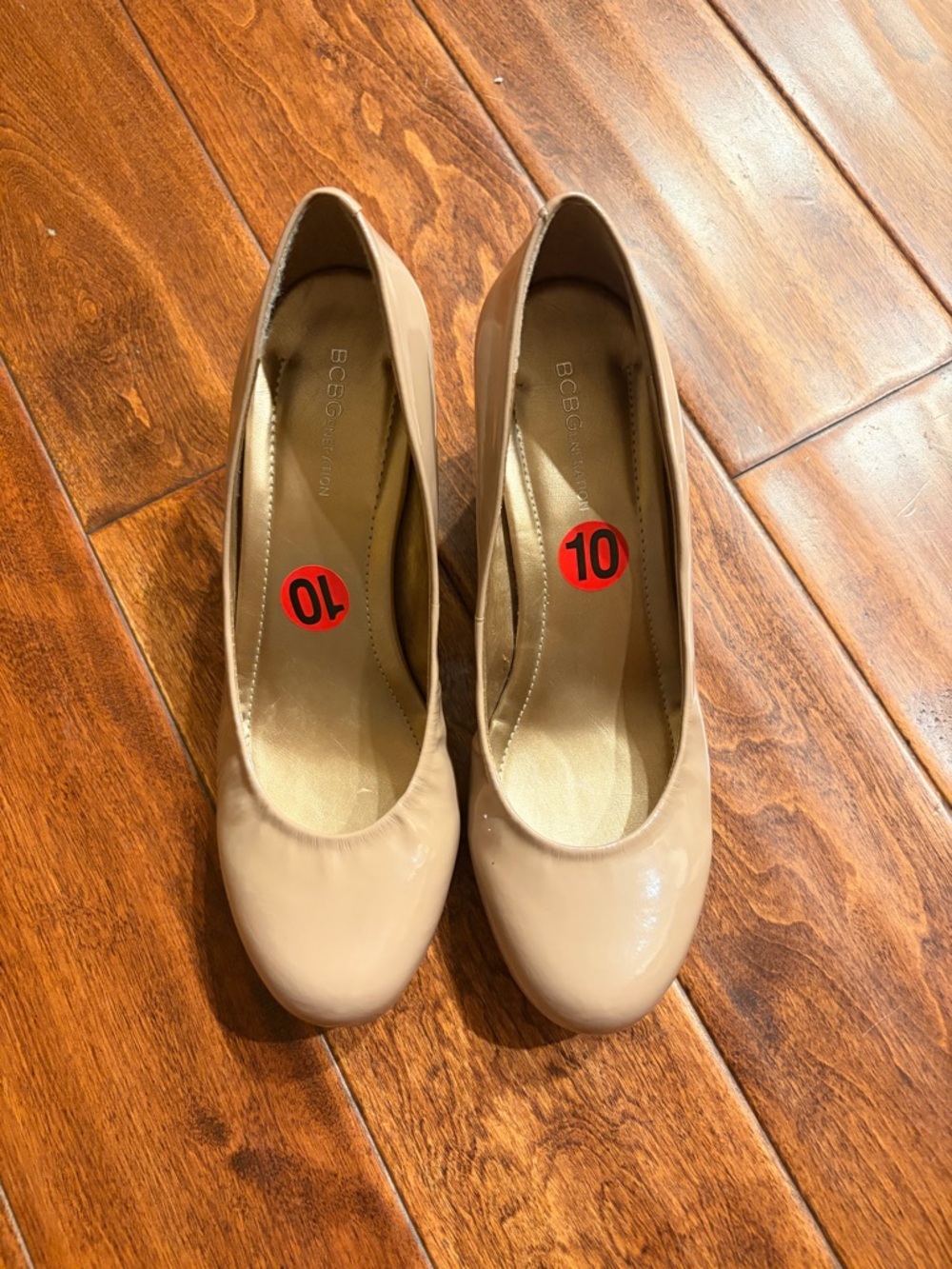 BCBGeneration Beige Patent Round-Toe Pumps